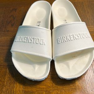 Slightly used Birkenstock white slides